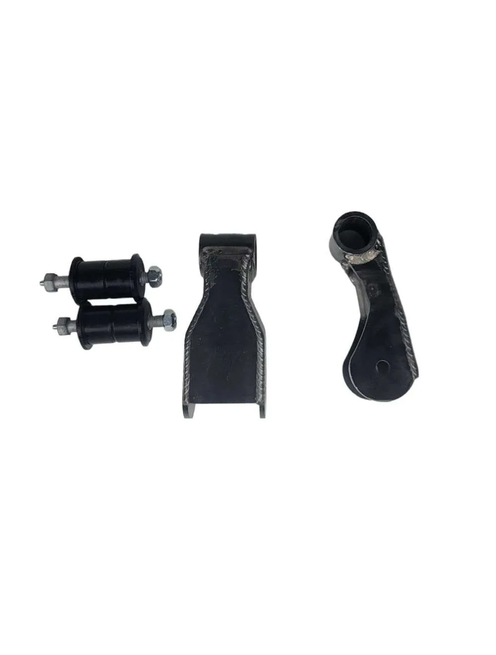 Sectioned rubber shackle bushing showing the inner sleeve, elastomer, optional outer shell, and mounting interfaces