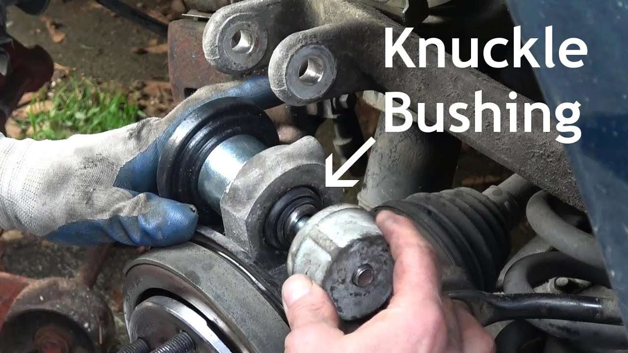 Rear knuckle bushing failure modes showing bond separation, sleeve migration, and controlled elastic deflection.